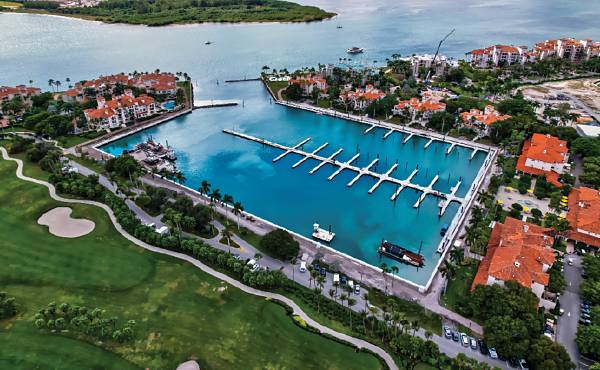 Fisher Island Clubs fixed slip marina system has now been reconfigured and replaced with Bellingham Marine floating docks to help mitigate problems with projected sea level rise.