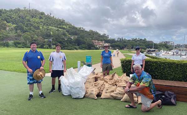 Enthusiastic volunteers braved the heat on Clean Up Australia Day to collect litter on land and sea near Coral Sea Marina.