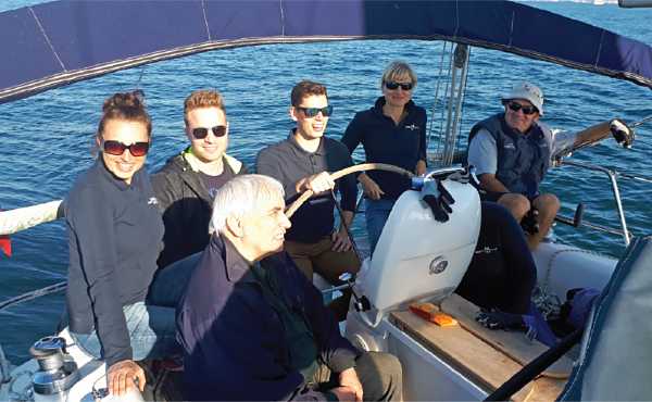 The Marina Master team enjoys a day out sailing.