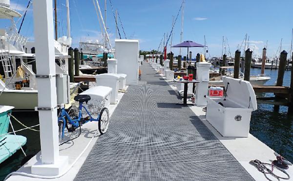 New fibre-mesh grated decking is non-slippery, safe under load, and allows sunlight to filter through to preserve marine life.