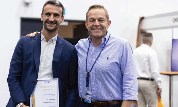 Antoine Repiton-Preneuf (left) of The Searial Cleaners accepting the Best Innovation Award from NZMOA secretary Phil Wardale.