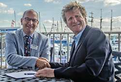 Robert Parton (left) president of British Marine shakes on the contract deal with Walcon managing director James Walters.